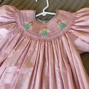 Lot of 3 smocked Christmas dresses.  Good used condition